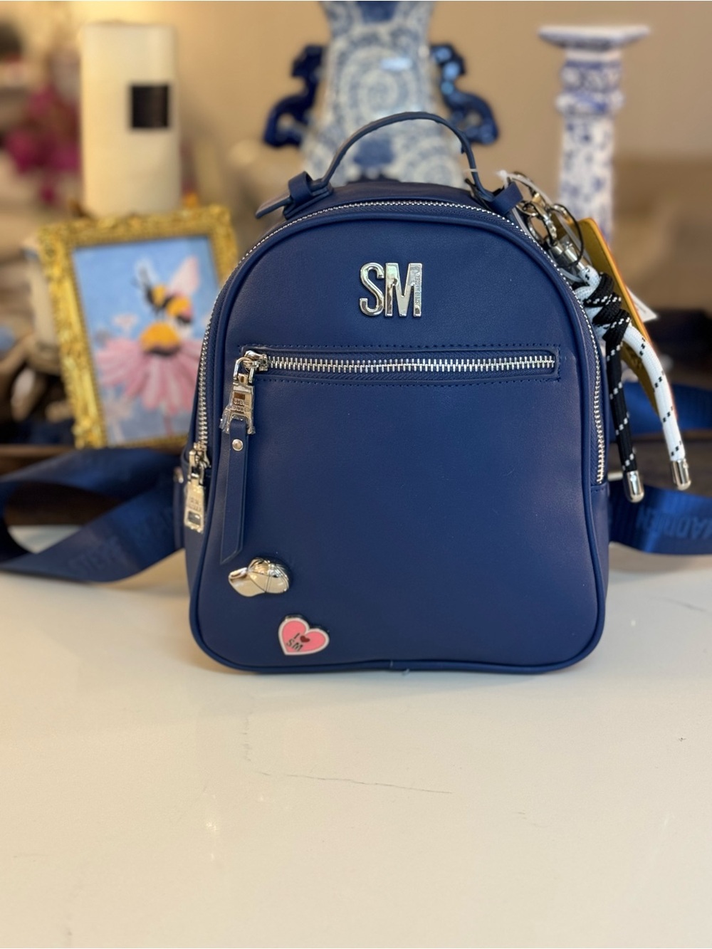 💙🩷NWT STEVE MADDEN EMBOSSED MINI BACKPACK DONE IN NAVY WITH SILVER HARDWARE!